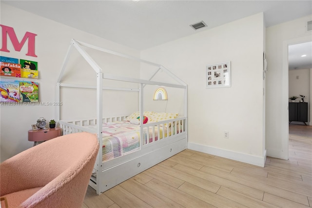 10989 NW 73rd Ter, Doral, FL 33178 - bedroom with wood finished floors and baseboards