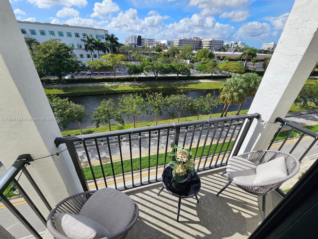 8301 NW 41st St Unit B-402, Doral, FL 33166 - balcony featuring a water view