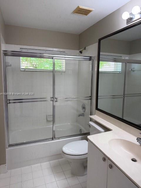 7964 La Rose Ct, Lake Worth, FL 33467 - bathroom with vanity and enclosed tub / shower combo