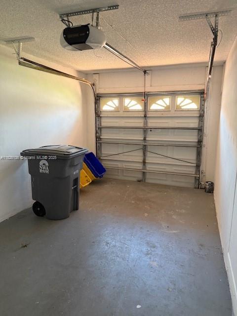 7964 La Rose Ct, Lake Worth, FL 33467 - garage with a garage door opener
