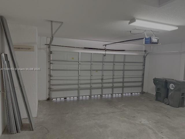 4390 NW 41st Pl, Coconut Creek, FL 33073 - garage with a garage door opener