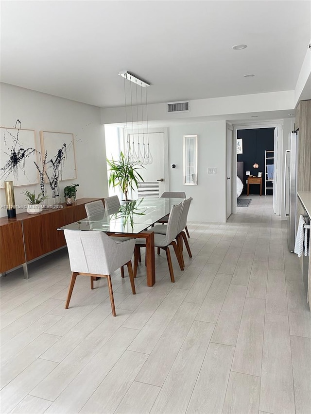 6620 Indian Creek Dr Unit 617, Miami Beach, FL 33141 - dining room featuring light wood finished floors