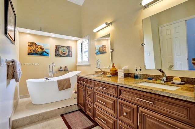 3820 SW 106th Ter, Davie, FL 33328 - full bathroom with double vanity, a freestanding tub, and tile patterned floors