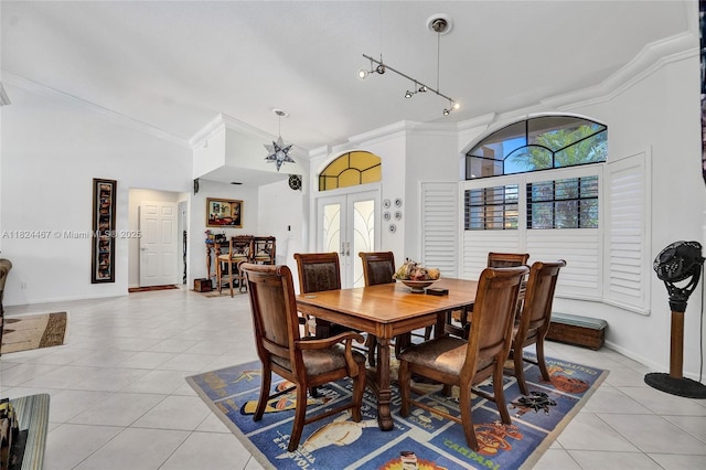 3820 SW 106th Ter, Davie, FL 33328 - dining area with light tile patterned flooring, french doors, ornamental molding, and high vaulted ceiling