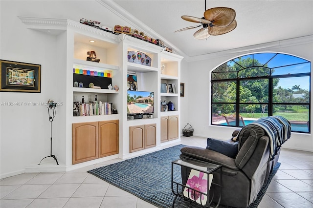 3820 SW 106th Ter, Davie, FL 33328 - living room featuring lofted ceiling, light tile patterned floors, ceiling fan, ornamental molding, and built in shelves