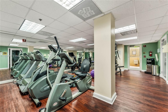 2951 S Bayshore Dr Unit 717, Miami, FL 33133 - workout area featuring a paneled ceiling and wood finished floors