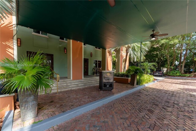2951 S Bayshore Dr Unit 717, Miami, FL 33133 - view of patio featuring a ceiling fan