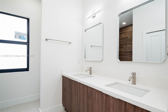 3216 40th St SW, Lehigh Acres, FL 33976 - full bath featuring double vanity and baseboards