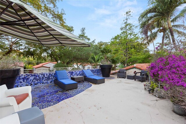 1301 Milan Ave Unit 2, Coral Gables, FL 33134 - view of patio / terrace featuring an outdoor living space