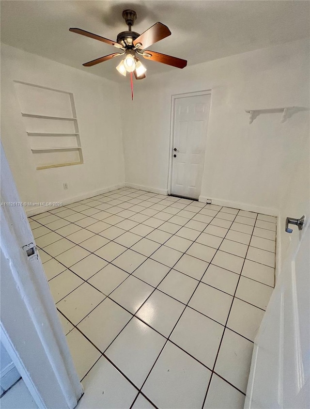 1041 NW 33rd Ave, Miami, FL 33125 - unfurnished room featuring light tile patterned floors and ceiling fan
