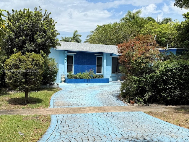 2247 NW 69th Ave, Sunrise, FL 33313 - view of front facade with stucco siding