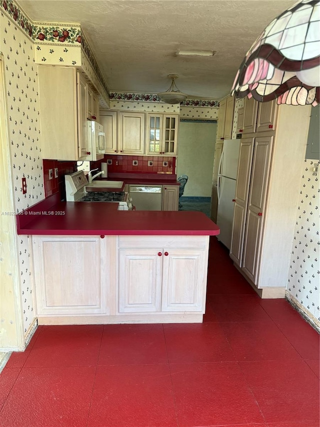 2247 NW 69th Ave, Sunrise, FL 33313 - kitchen featuring white appliances, wallpapered walls, a peninsula, glass insert cabinets, and a textured ceiling