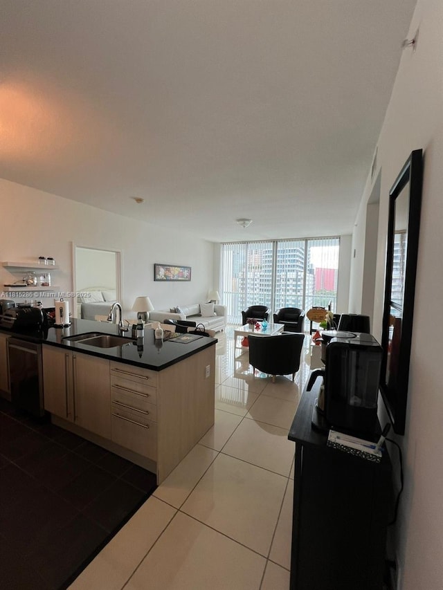 79 SW 12th St Unit 1603-S, Miami, FL 33130 - kitchen with open floor plan, dark countertops, tile patterned floors, and dishwasher