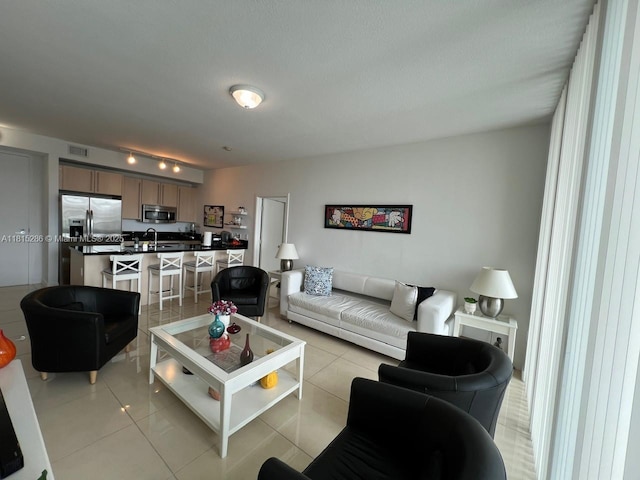 79 SW 12th St Unit 1603-S, Miami, FL 33130 - living area with light tile patterned floors
