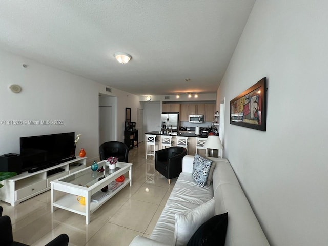 79 SW 12th St Unit 1603-S, Miami, FL 33130 - living room with light tile patterned floors