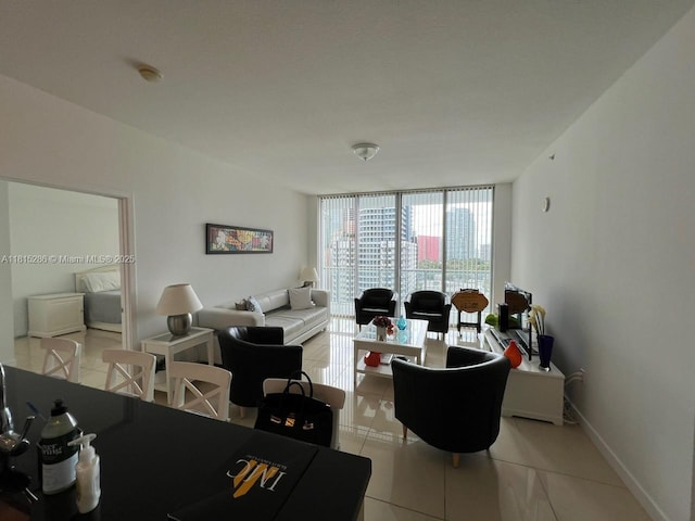 79 SW 12th St Unit 1603-S, Miami, FL 33130 - living area with light tile patterned floors and a wall of windows
