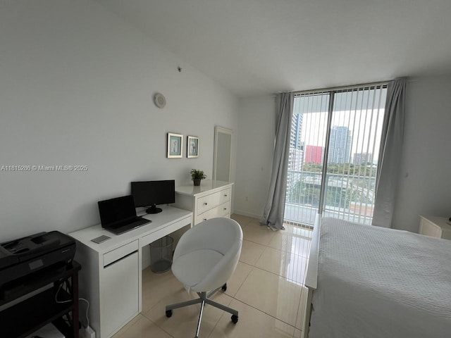 79 SW 12th St Unit 1603-S, Miami, FL 33130 - bedroom with an office area and light tile patterned floors