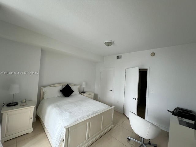 79 SW 12th St Unit 1603-S, Miami, FL 33130 - bedroom with light tile patterned floors