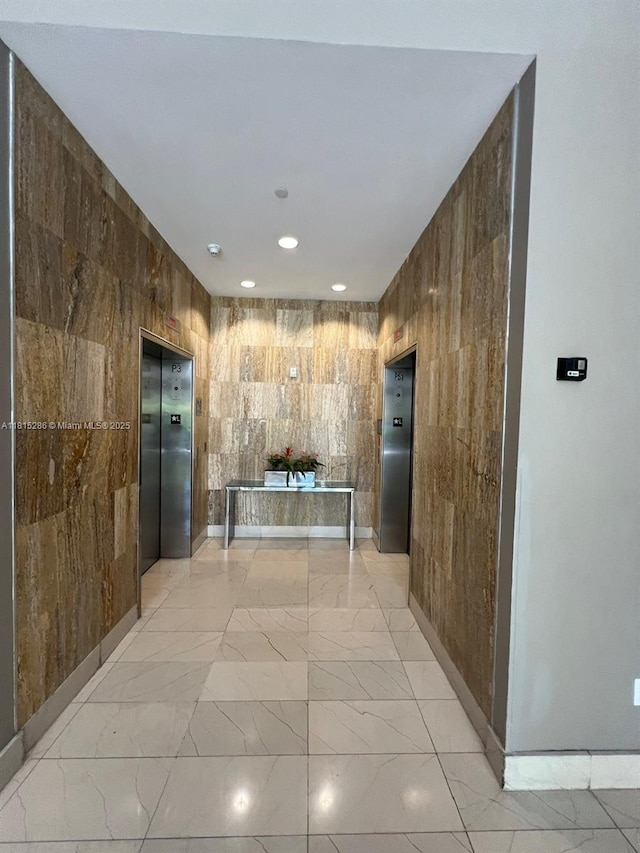 79 SW 12th St Unit 1603-S, Miami, FL 33130 - hall with elevator, light marble finish floors, and recessed lighting