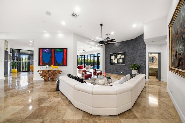 17490 SW 70th Pl, Southwest Ranches, FL 33331 - living room featuring recessed lighting, light marble finish floors, and ceiling fan