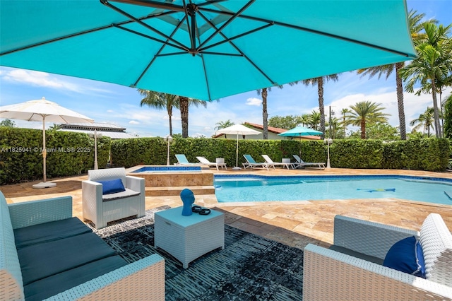 17490 SW 70th Pl, Southwest Ranches, FL 33331 - view of swimming pool with a hot tub, a patio, and a fenced backyard