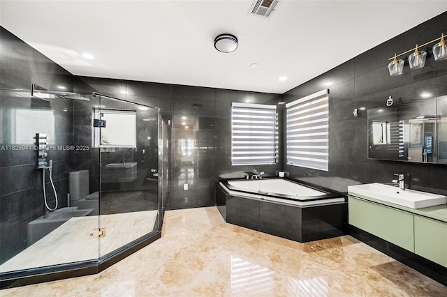17490 SW 70th Pl, Southwest Ranches, FL 33331 - bathroom with a bath, vanity, a shower stall, and tile walls