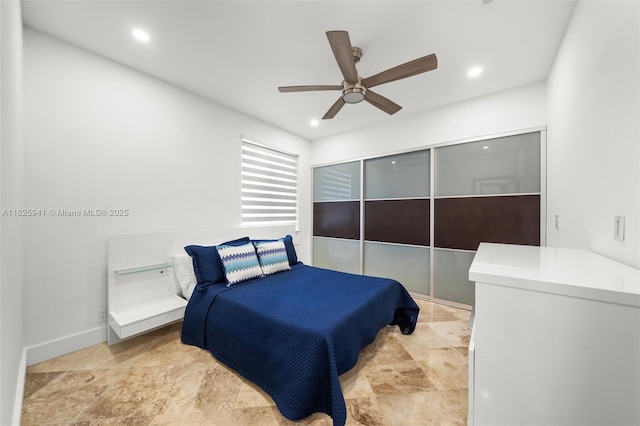17490 SW 70th Pl, Southwest Ranches, FL 33331 - bedroom featuring stone finish floors, recessed lighting, and a ceiling fan