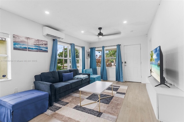 1408 N 23rd St, Fort Pierce, FL 34950 - living area featuring a wall mounted air conditioner, light wood-style flooring, a ceiling fan, and recessed lighting
