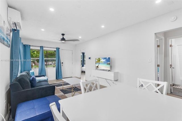 1408 N 23rd St, Fort Pierce, FL 34950 - living room featuring a wall unit AC, recessed lighting, and a ceiling fan
