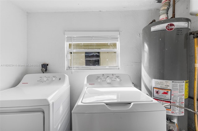 1408 N 23rd St, Fort Pierce, FL 34950 - washroom featuring gas water heater and washing machine and clothes dryer
