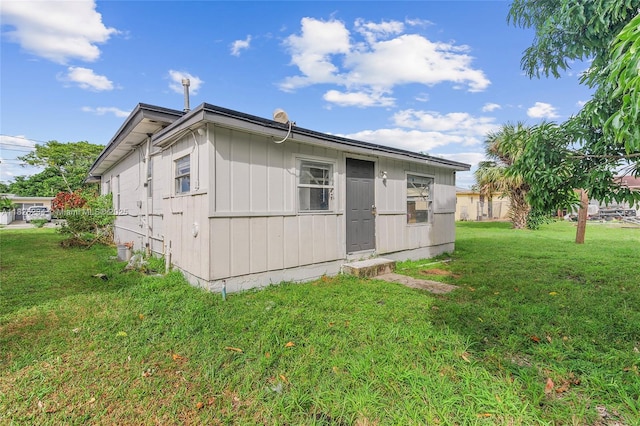 1408 N 23rd St, Fort Pierce, FL 34950 - view of home's exterior with a yard
