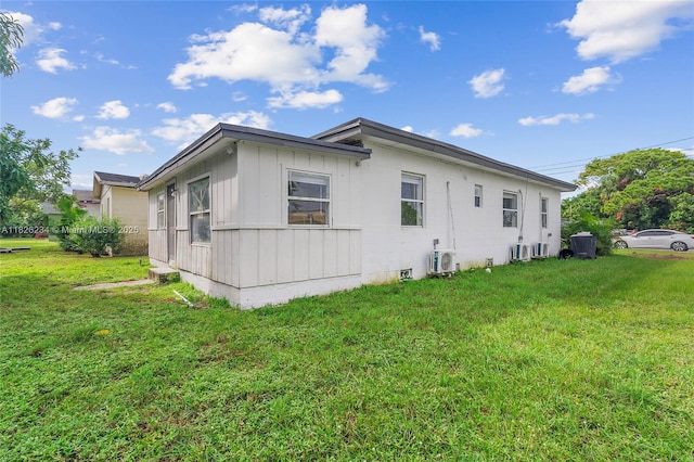 1408 N 23rd St, Fort Pierce, FL 34950 - view of home's exterior featuring a yard and board and batten siding