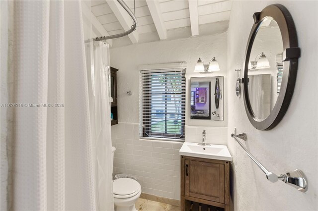 1301 Milan Ave Unit 3, Coral Gables, FL 33134 - full bath featuring beam ceiling, vanity, curtained shower, tile walls, and wainscoting