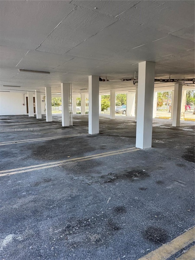 2025 NE 164th St Unit 206, North Miami Beach, FL 33162 - view of parking garage