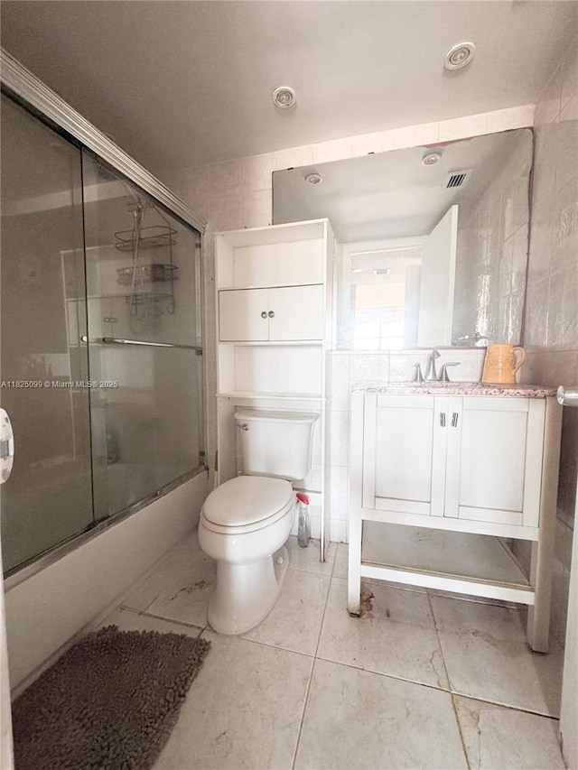 2025 NE 164th St Unit 206, North Miami Beach, FL 33162 - full bathroom featuring bath / shower combo with glass door and vanity