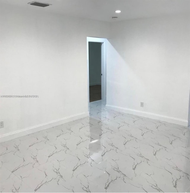 6710 SW 18th Ct, North Lauderdale, FL 33068 - empty room with light marble finish floors and recessed lighting