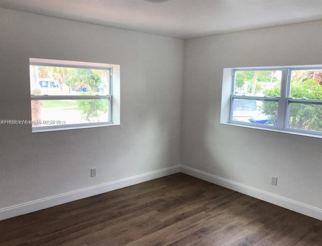 6710 SW 18th Ct, North Lauderdale, FL 33068 - spare room with dark wood finished floors and baseboards