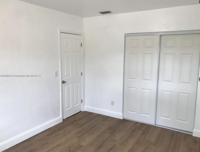 6710 SW 18th Ct, North Lauderdale, FL 33068 - unfurnished bedroom with dark wood-style floors and a closet