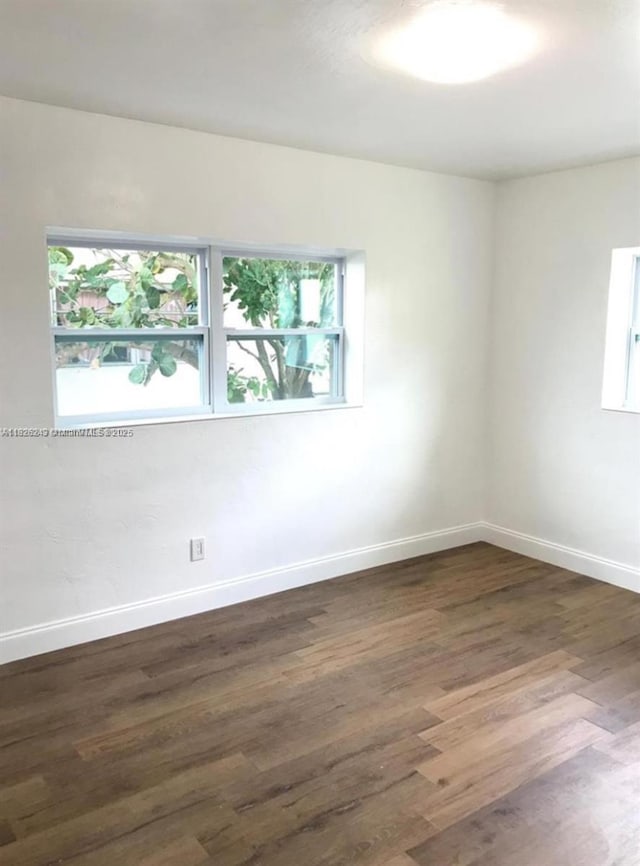 6710 SW 18th Ct, North Lauderdale, FL 33068 - spare room featuring wood finished floors and baseboards