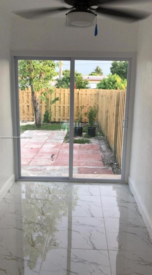6710 SW 18th Ct, North Lauderdale, FL 33068 - entryway with marble tiled floors and baseboards