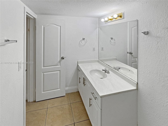5201 Geneva Way Unit 201, Doral, FL 33166 - bathroom with tile patterned flooring, vanity, a textured ceiling, and a textured wall