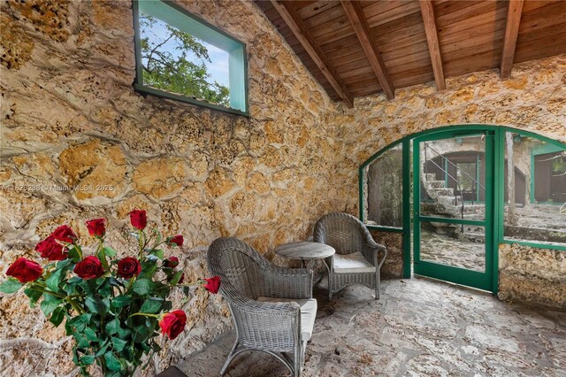 1301 Milan Ave Unit 4, Coral Gables, FL 33134 - unfurnished room featuring a wooden ceiling with exposed beams and high vaulted ceiling
