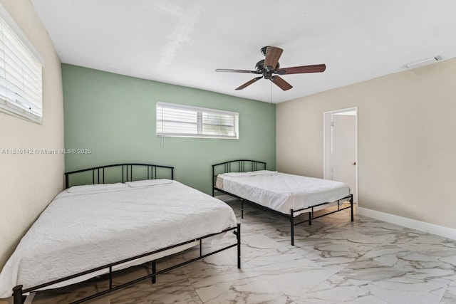 919 NE 4th St, Hallandale Beach, FL 33009 - bedroom with marble finish flooring and a ceiling fan