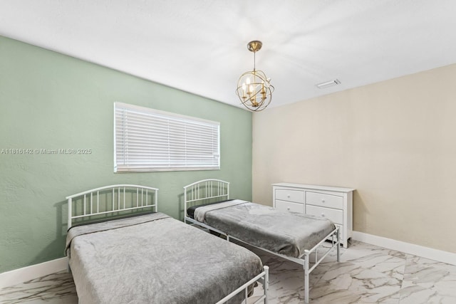 919 NE 4th St, Hallandale Beach, FL 33009 - bedroom featuring marble look tile flooring and a chandelier