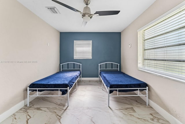 919 NE 4th St, Hallandale Beach, FL 33009 - bedroom with multiple windows, marble finish floors, and ceiling fan