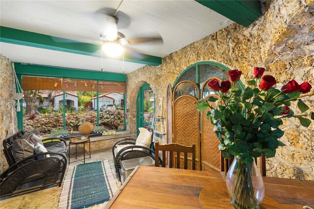 1301 Milan Ave Unit 1, Coral Gables, FL 33134 - dining area featuring a ceiling fan and beam ceiling