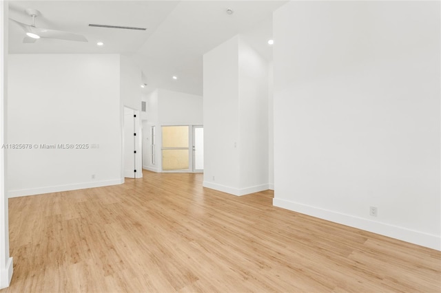 9047 Baybury Ln, West Palm Beach, FL 33411 - unfurnished room with light wood-style floors, ceiling fan, high vaulted ceiling, and recessed lighting