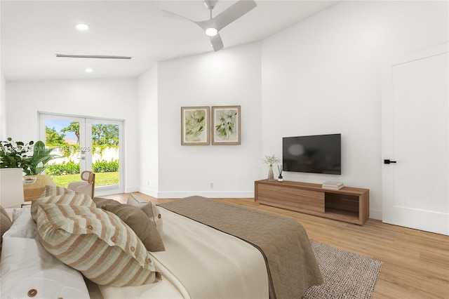 9047 Baybury Ln, West Palm Beach, FL 33411 - bedroom with lofted ceiling, recessed lighting, wood finished floors, french doors, and access to exterior