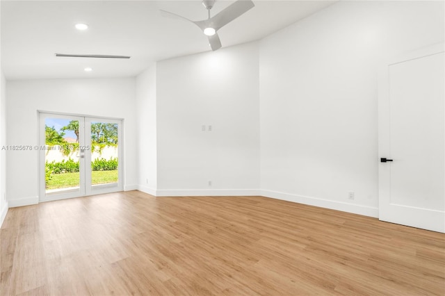 9047 Baybury Ln, West Palm Beach, FL 33411 - spare room featuring vaulted ceiling, recessed lighting, light wood finished floors, and ceiling fan