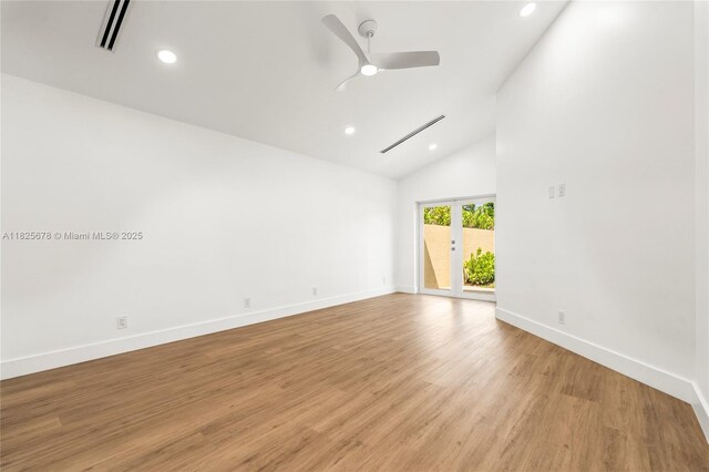 9047 Baybury Ln, West Palm Beach, FL 33411 - spare room featuring recessed lighting, a ceiling fan, light wood-style floors, and high vaulted ceiling